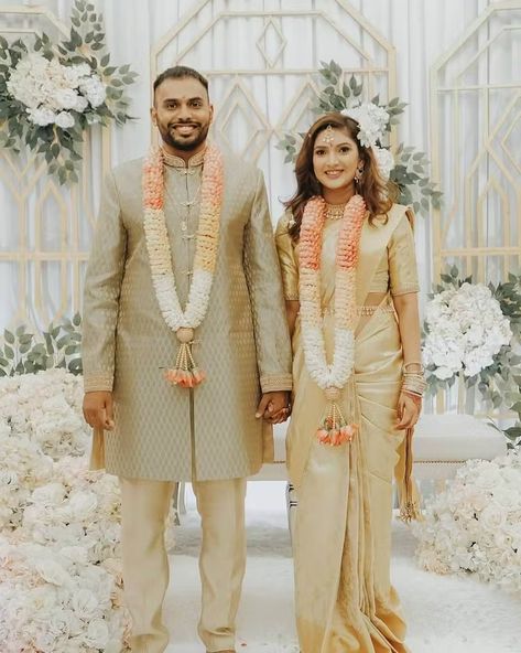 The significance of garlands in South Asian weddings lies in their symbolic representation of acceptance, love, and respect. Varmala Designs, Rose Garland Wedding, Pink Bridal Lehenga, Engagement Stage Decoration, Indian Wedding Garland, Garland Wedding Decor, Flower Garland Wedding, Tamil Wedding, Red And White Roses