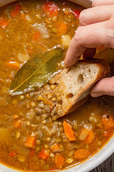 Discover a comforting recipe for Spanish lentil stew (known as lentejas, or lentejas con verduras), combining tender lentils with homely vegetables, creating a blend of flavors that will delight your palate. Explore this delicious lentil recipe and bring the authentic Spanish taste to your table. Keep it chunky and enjoy with fresh crusty bread or up the stock and enjoy as a soup. Portuguese Lentil Soup, Puerto Rican Lentil Soup, Spanish Lentil Recipes, Lentil Soup With Ground Beef, How To Make Lentejas, Medditeranean Lentil Soup, Can Lentil Recipes Healthy, Carabas Lentil Soup, Spanish Lentil Stew