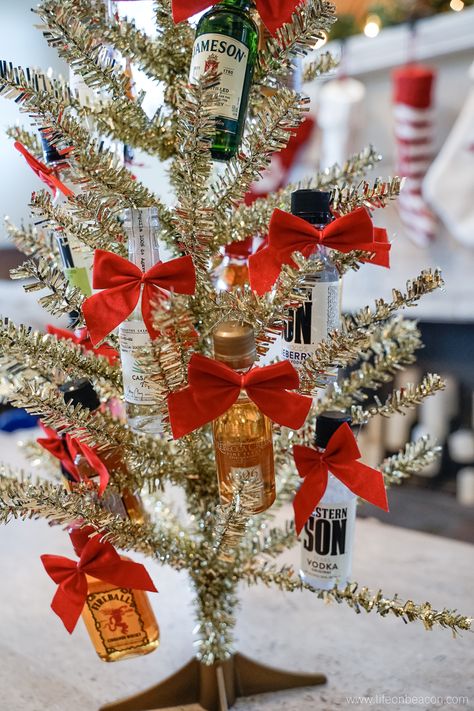 Mini Liquor Bottle Christmas Tree | Life on Beacon Mini Liquor Bottle Christmas Tree, Liquor Bottle Gift Ideas, Mini Liquor Bottle Gift Ideas, Mini Alcohol Bottles Gifts, Bottle Gift Ideas, Bottle Christmas Tree, Liquor Gift Baskets, Mini Alcohol Bottles, Best White Elephant Gifts