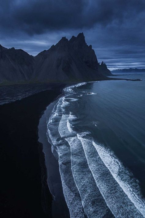 Black sand beach at Vesturhorn Mountain, Iceland #blacksandbeach #beach #iceland #europe #nature #travel Dark Naturalism, Iceland Photography, Ends Of The Earth, Black Sand Beach, Types Of Photography, Iceland Travel, Black Sand, Aerial Photography, Ocean Beach