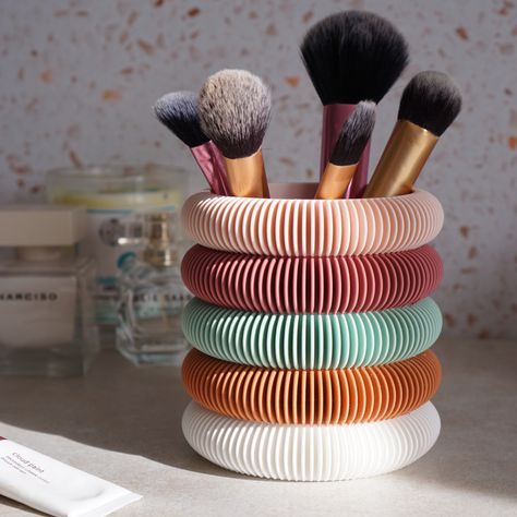 🫧 Cute bubble textured pot🍃 3D Printed using plant based materials💪 Light yet sturdy and durable accessory Multi-coloured storage pot to brighten up your bedroom, bathroom, desk, dresser or vanity! Designed and 3D printed by us, this fun and unique storage pot is perfect for organising all your pens, pencils, makeup brushes or skincare items as well as any other bits and bobs you can fit. **Want to change up the order of colours to make your pot uniquely orders? Just send us a message through Skincare Items, Unique Homewares, Desk Inspo, Unique Home Accessories, Unique Storage, Desk Dresser, Printed Coasters, Maximalist Decor, Home Organisation