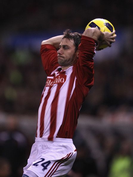 Rory Delap of Stoke City in 2010. Stoke City Fc, Stoke City, Rain Jacket, Football, Quick Saves, American Football