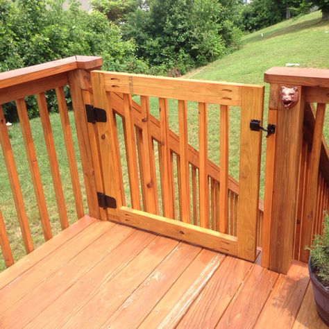 Custom built gate made from 2x4s and balusters. KregJig'd together. Sanded. Stained. Sealed. And gate hinge kit added. Wood Deck Gate, Wooden Deck Gate, Gates For Decks Stairs, Wood Porch Gate, Diy Porch Gate Dogs, Gate For Deck Stairs, Pool Deck Gate Ideas, Gate On Deck, Patio Gate Ideas