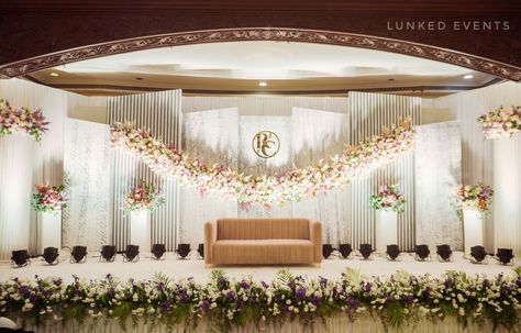 Transform your reception into a magical evening with our stunning stage decor! ✨ From elegant backdrops to intricate floral arrangements, we craft the perfect setting for your special day. 🌹 Contact us now to bring your dream reception to life! 📞 Event Planned & Decor by - @lunkedevents Bride : @ruchi_punmia Groom : @chirag_0204 Couple : @raag_se_ruh_tak Memory : @shyam [Reception Stage, Event Decor, Wedding Decor , Elegant Weddings, Chennai Events, Floral Design , Dream Wedding, Call ... Reception Stage Decoration Backdrops, Dream Reception, Reception Stage, Reception Stage Decor, Reception Backdrop, Wedding Reception Backdrop, Garden Reception, Stage Decor, Desi Wedding Decor