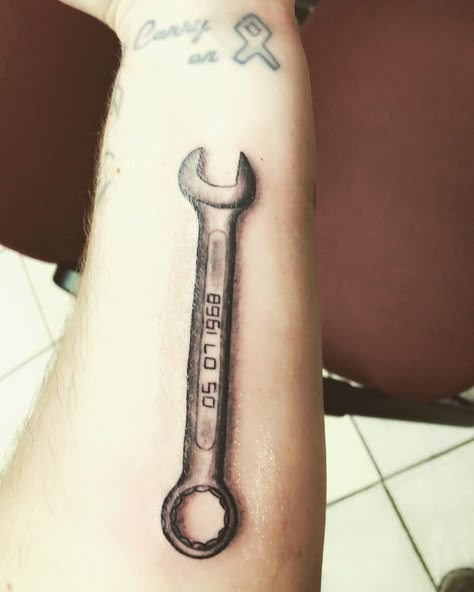 Wrench tattoo Wrench Finger Tattoo, Tattoo Tools Mechanic, Memorial Wrench Tattoo, Mechanic Memorial Tattoo, Wrench Tattoo Design, Wrench Tattoo Mechanic, Tool Tattoo Mechanic, Mechanic Tattoo For Men, Mechanic Tattoo Ideas