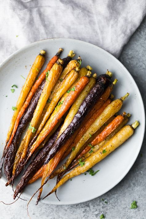 Honey Roasted Carrots (make ahead) | sweetpeasandsaffron.com Thanksgiving Recipes Make Ahead, Colored Carrots, Sweet Peas And Saffron, Carrots Sweet, Raw Sweet Potato, Easter Feast, Honey Roasted Carrots, Thanksgiving Food Sides, Honey Roasted