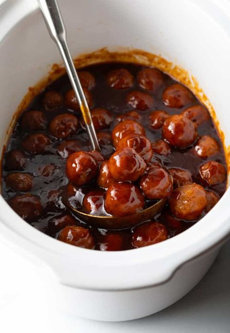 Easy Crockpot BBQ Meatballs Recipe - A Spicy Perspective Bourbon Meatballs Crockpot Appetizers, Sticky Bbq Meatballs, Cocktail Meatball Recipe, Meatball Recipes Bbq, Barbecue Meatballs Crockpot, Spicy Bbq Meatballs, Crockpot Meatballs Appetizers, Appetizer Meatballs Crockpot, Spicy Meatballs Crockpot