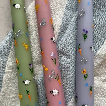 Beautifully hand painted Easter Spring Candles with sheep, ducklings, tulips, carrots, bunnies, daffodils and eggs.nullThese candles are made from unscented wax and hand painted with non-toxic paint - please handle them with care.null24cm tall Spring Candles, Non Toxic Paint, Daffodils, Easter Spring, Tulips, Carrots, Sheep, Wax, Easter