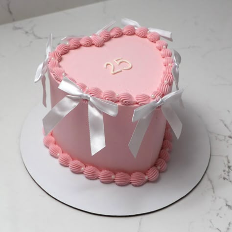 25 🤍🎀 - Cake Details - Size: Mini 6” (2 layers) serves 4-6 Add-ons: White bows (not edible) + pearls (edible) #emmacakes #customcakes #emmacakesseattle #customvintagecakes #seattlecakes #seattleheartcake Mini Cake Designs, White And Pink Cake, Pink And White Cake, Shaped Cakes, Edible Pearls, Vintage Cakes, Heart Cakes, Fun Cakes, Mini Cakes Birthday