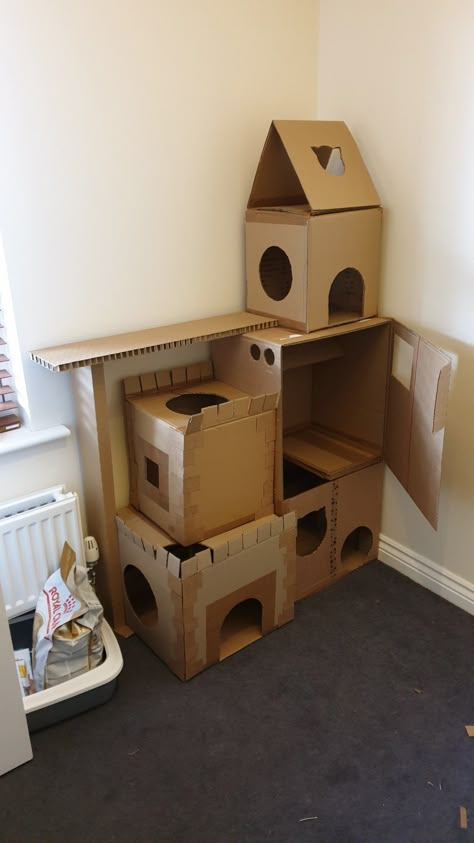 Easy DIY cardboard castle for your cat. Cat House Of Cardboard, Cat Tower Diy Cardboard, Cardboard Kitty House, Bunny House Indoor Diy Cardboard, Cardboard House For Cats Diy, Cat Tree Diy Cardboard, Diy Cat Condo Cardboard, Cardboard Cat Castle Diy, Diy Cardboard Cat Toys