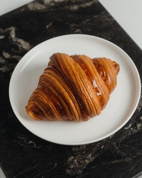 A plain croissant holds a story of simplicity and perfection. Crafted exclusively with Isigny St Mere Butter, our croissants take three days to reach their golden, flaky best. No wonder it’s our pastry chefs’ favourite! 🥐✨ Cafe Treats, Butter Croissant, Whipped Butter, Pastry Chef, Three Days, Cute Food, Pastry, Chef, Butter