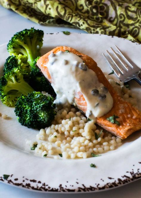 Oven roasted orange salmon with caper sauce. Super easy and elegant. Caper Sauce For Salmon, Healthy Salmon Dinner Recipes, Creamy Caper Sauce, Easy Salmon Dinner, Healthy Salmon Dinner, Roasted Salmon Recipes, Salmon Recipes Oven, Easy Salmon Recipe, Salmon Dinner Recipes