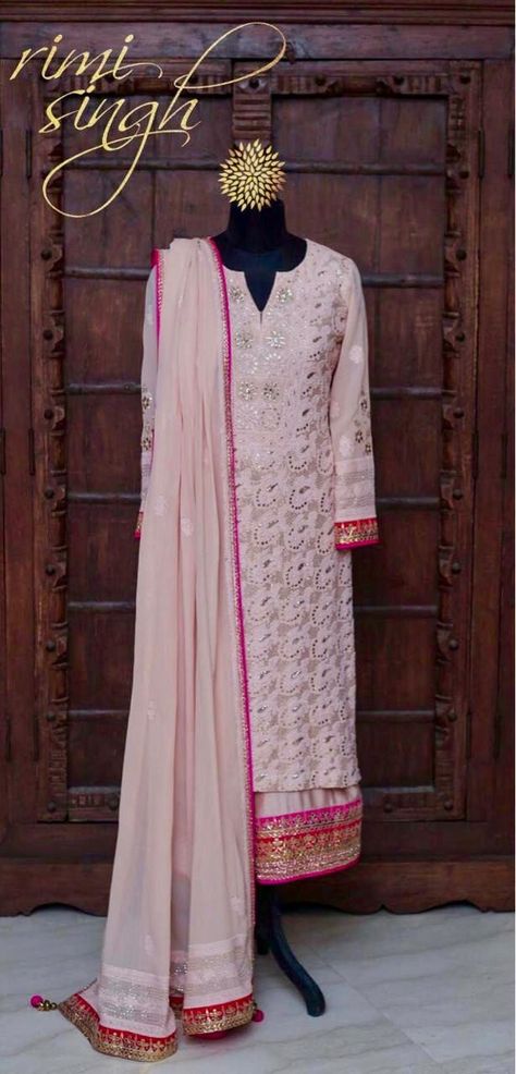 "Real beauty is reflected in the eyes, and it consumes the darkness to light the way for others"  Blush pink chikenkari pure georgette  kurta with mukaish work, teamed with a matching cotton silk palazzo and pure georgette dupatta. There is gota patti  embroidery on the sleeves and edge of the palazzo.  Available exclusively at  Rimi Singh Studio A 999 Sushant Lok 1  Gurgaon  #9818310054 Pink Kurti Combination, Dark Pink Kurti Combination, Dark Pink Kurti, Gota Patti Embroidery, Darkness To Light, Mukaish Work, Georgette Kurta, Georgette Dupatta, Light The Way