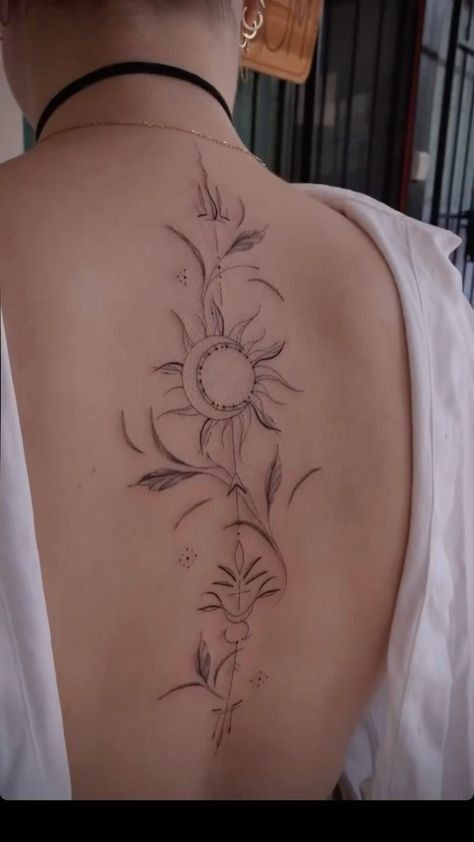 Earthy Spine Tattoos For Women, Sun And Moon Back Tattoo Spine, Tattoos Back Spine, Sun And Moon Hip Tattoo, Sun Back Tattoo Women, Ornamental Spine Tattoos, Sun Moon Flower Tattoo, Earth Spine Tattoo, Celestial Spine Tattoo