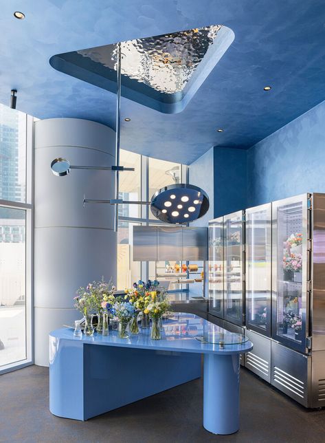 Narrow Retail Store Design, Stone Island Store, Sky Blue Paint, Flower Shop Interiors, Laboratory Design, Communal Table, Retail Concepts, Flower Boutique, Flower Store