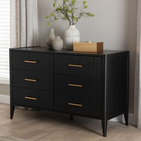 Channel the elegance of timeless craftsmanship with the refined grace of the Primrose dresser. Made in Malaysia, this mid-century piece is crafted from sturdy wood. Six interlocking drawers offer superb storage space for clothes, linens, and more while reserving the tabletop as a spacious display area. The Primrose requires assembly and is affixed with chic metal handles for an eye-catching touch. With fluted drawer faces steeped in classic artistry, the Primrose dresser brings enduring beauty t Fluted Wood, Dresser In Closet, Black Dresser, Modern Contemporary Home, Modern Closet, Accent Chest, Comforter Bedding Sets, Vintage Halloween Decorations, Cat Bed Furniture