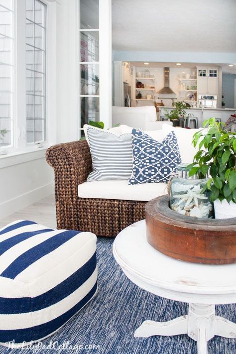 Lake House Blue and White Sunroom: The Lilypad Cottage White Sunroom, Family Friendly Living Room, Deco Marine, Sunroom Decorating, Coastal Living Rooms, Beach House Interior, Coastal Living Room, Blue Home Decor, Beach Cottage Style