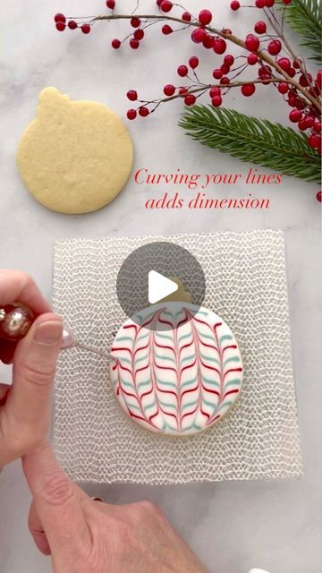 Mary Mansfield on Instagram: "Need a fun, quick and simple way to make impressive Christmas cookies? This ornament cookie (or bauble to some of you) uses one of my favorite techniques and it couldn’t be easier! Watch the reel for step by step instructions and tips! Cutter from @annclarkcookiecutters #cookievideo #cookiedecoratingvideo #cookiedecoratingtutorial #cookietutorial #ornamentcookies #christmascookies #royalicing #royalicingcookies #decoratedcookies #icingcookies #decoratedsugarcookies #cookiedecorating #cookiesofinstagram" Iced Christmas Tree Cookies, Icing Sugar Cookies For Beginners, Round Christmas Cookies Decorated Buttercream, Christmas Cookies Ornaments, Christmas Cutout Cookie Decorating Ideas, Sugar Cookie Tree Decorating, Christmas Cookies With Buttercream Icing, How To Frost Sugar Cookies, Cookie Decorating Tutorial Videos