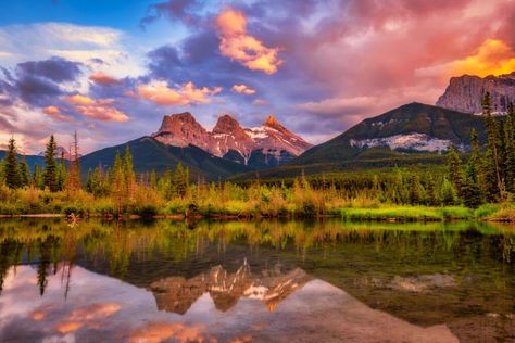 If you have visited the town of Canmore, or nearby Banff, you have likely seen, or at least heard about the Three Sisters in Canmore. They are easily the Gorgeous Backyards, Quarry Lake, Things To Do In Banff, Canmore Alberta, The Three Sisters, Mining Town, Canada Travel Guide, Banff Canada, Lake Trip