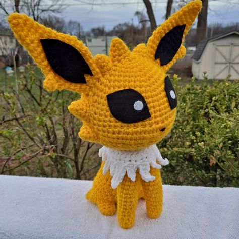 Pokemon Jolteon Amigurumi (Crochet Toy) Crochet Jolteon, Jolteon Crochet, Crocheted Pokemon, Pokemon Jolteon, Felt Eyes, Crochet Pokemon, Pokemon Plush, All Pokemon, Crochet Toy