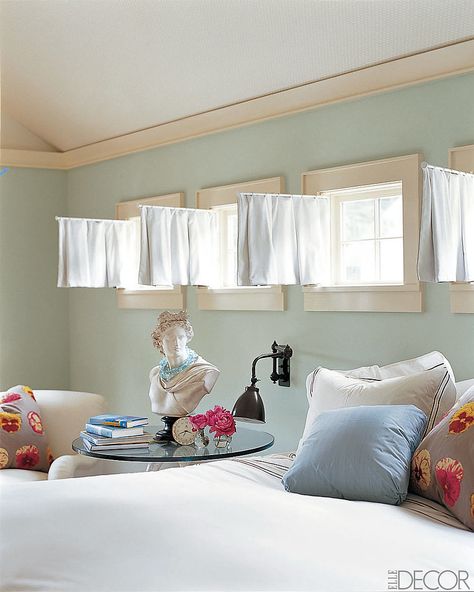 Try swinging-arm curtains! You simply mount a swing-arm rod to one side of the window and attach an appropriately sized curtain. They're a unique and efficient way of controlling light. Basement Window Curtains, Small Window Treatments, Window Curtains Bedroom, High Windows, Small Window Curtains, Basement Windows, Window Treatments Bedroom, Small Basements, Window Curtain Rods