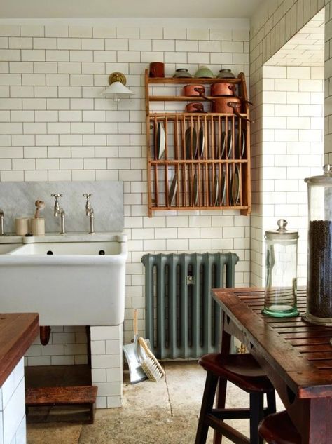 Kitchen with Subway Tiles and Plate Rack | Remodelista Extremely Small Kitchen, Wall Mounted Dish Rack, Old Fashioned Kitchen, Kitchen Apartment, Plate Rack, Pie Safe, Vintage Details, Vintage Elements, Kitchen Farmhouse