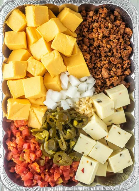 With this smoked queso, you just throw all of the ingredients in a pan and let your smoker do the work. #smokedqueso #queso | chiselandfork.com Smoked Queso, Smoked Jalapeno, Smoked Chicken Wings, Queso Recipe, Jalapeno Recipes, Queso Dip, Smoked Cooking, Potluck Dishes, Steak Bites