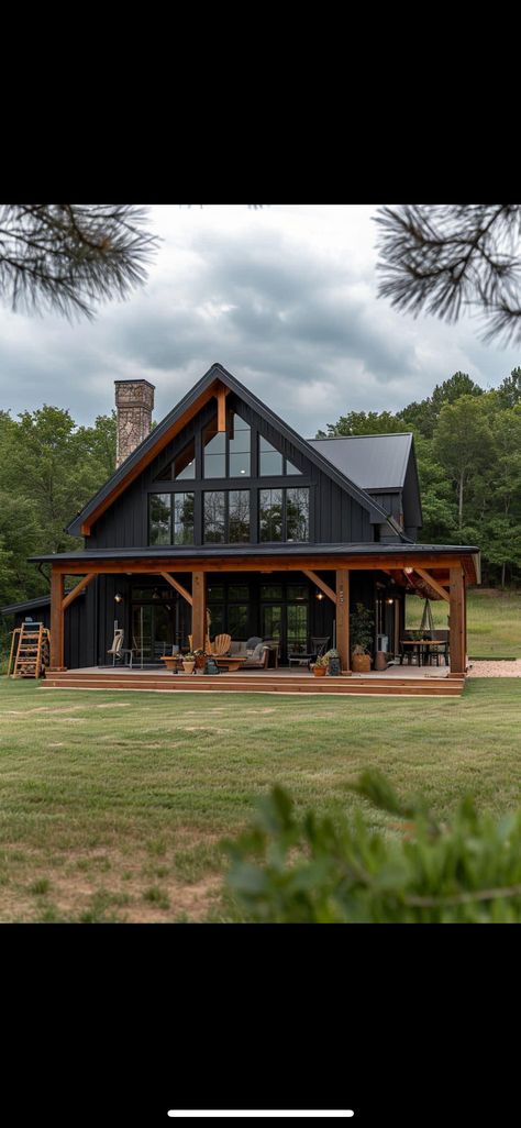 Dark House With Cedar Accents, Old Farmhouse Barndominium, Brick And Metal House, Exterior Cabin Design, Small Black Barndominium Ideas, Barndominium Black Exterior, Dark Barndominium Ideas, Black House With Wrap Around Porch, Black Barnodium Homes