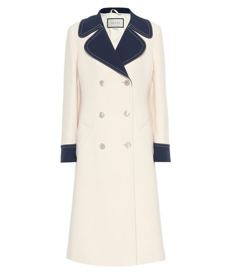 Gucci - Double-breasted wool coat - Gucci's rich wool coat flaunts elegant tailoring in a fresh shade of ivory, framed by a navy lapel and cuffs. Silver buttons punctuate its double-breasted front, pulling together its vintage-inspired chic. Let yours layer ensembles with a ladylike finish. seen @ www.mytheresa.com Gucci Coat Women, Gucci Coat, Venus Fashion, Royal Outfits, Coat Women, 72 Hours, Gucci Shoes, Historical Fashion, Winter Fashion Outfits