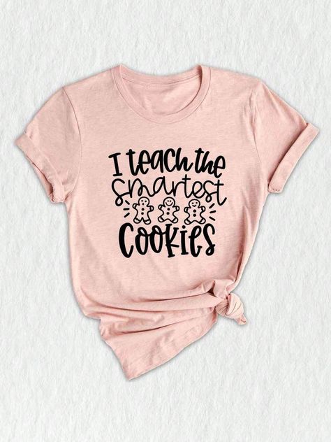 Introducing our latest design - the "I Teach Smartest Cookies" Teacher Shirt! ✨ This Winter Holiday Tee is perfect for all the Xmas-loving teachers out there who are ready to spread some holiday cheer in the classroom.  Whether you're looking for a fun Back to School Shirt or a Teacher Life Shirt that showcases your love for teaching, this trendy and stylish tee is for you!  The design on this Teacher Saying Shirt features a festive holiday theme, with a cute Christmas gnome surrounded by a pile of delicious cookies!  It's a perfect representation of the joy and warmth that the holiday season brings, while highlighting the important role that teachers play in shaping young minds.   Made with premium quality materials, this Ready for Class Tee offers unmatched comfort and durability. It's d Teacher Winter Shirts, Preschool Teacher Christmas Shirts, Teacher Fall Shirts, Teacher Shirts Designs, Christmas Teacher Shirts, Teacher Christmas Shirts, Circuit Shirts, Cookie Shirt, Family Reunion Shirts