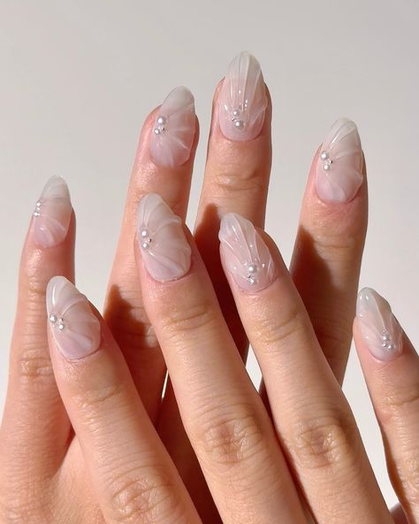 🤍Pearl Shells - 🐚 These premium handmade press-on nails feature a translucent white base with elegant 3D shell-like designs, accented by small pearls for a sophisticated and ethereal look. #nomoodnails #3dnailart #handmadenails #pressons #whitenails #shortnails Simple Nails With Pearls, Designs For Small Nails, Nail Designs For Small Nails, White Pearl Nails, Nails With Pearls, Nails Flower, 3d Nail Designs, Pearl Nails, 3d Nail Art