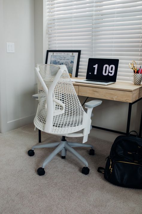 Herman Miller Sayl chair in white, writing desk, Fliqlo screensaver in Dallas Home office Herman Miller Sayl Chair Home Office, Herman Miller Desk Chair, Herman Miller Sayl Chair, Herman Miller Sayl, Herman Miller Desk, Working Chair, Fritz Hansen Furniture, Sayl Chair, White Writing Desk