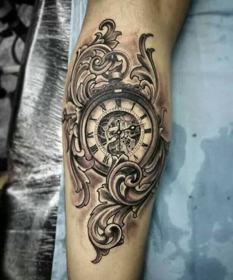 This tattoo shows a complete image of a clock with spiraling leaves going around it. The clock is in roman numerals and is pointing at 2:30. It is fairly large and looks good on the wrist too.  #tattoofriday #tattoos #tattooart #tattoodesign #tattooidea Pocket Watch Tattoos, Filigree Tattoo, Clock Tattoo Design, Pocket Watch Tattoo, Tattoos Geometric, Geniale Tattoos, Watch Tattoos, Clock Tattoo, Music Tattoos