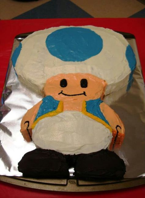 Blue toad birthday cake! Cut and shaped from 1 round and 1 large sheet cakes. Mario Toad Birthday Cake, Super Mario Toad Cake, Mario Toad Cake, Cake Ideas For Kids Boys, Toad Birthday Cake, Toad Cake, Birthday Cake Ideas For Kids, Ghost Food, Mario Toad