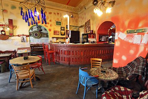 PHOTO: Crazy colors and mismatched furniture are de rigueur at Insomnia Cafe in Cluj-Napoca, Romania Pune Cafe, Raspberry Juice, Romania Tourism, Temisvar Romania, Mismatched Furniture, Cluj Romania, Constanta Romania, Cluj Napoca, Globe Travel