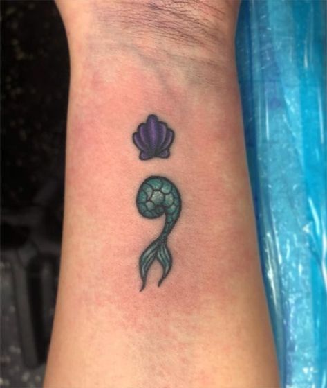 Disney Semicolon Tattoo, Ursula Shell Tattoo, Mermaid Semicolon, Ursula Tattoo, Mermaid Tail Tattoo, Sea Life Tattoos, Michigan Tattoos, Colon Tattoo, Little Mermaid Tattoo