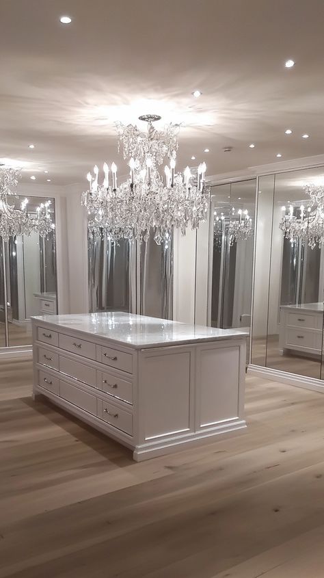 Transform your wardrobe dreams with Leo's opulent master closet! ✨ Featuring a sleek center island, stunning LED-lit shoe shelves, elegant full-length mirrors, and a glamorous chandelier for that ultimate luxe vibe. 👠💎🌟 Perfectly designed for your fashion fantasies! 😍🛍️ Luxe Closet, Glamorous Chandelier, Future Mansion, Mansion Decor, Glam Closet, Shoe Shelves, Glam Room, Business Lifestyle, Lifestyle Ideas