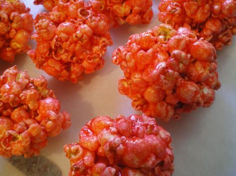 I got this recipe in jr. high school in my Home Ec class.  We made them for all the holidays and just used different flavored Jello. Jello Popcorn Balls Recipe, Jello Popcorn Balls, Jello Popcorn, Flavoured Popcorn, Corn Balls, Popcorn Balls Recipe, Jello Gelatin, Jello Flavors, Colored Popcorn