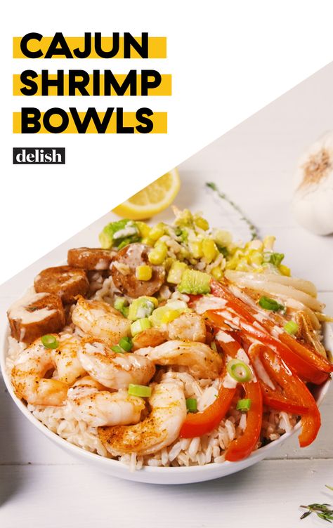 Cajun Shrimp Bowls have all of the flavor — and none of the guilt. Get the recipe at Delish.com. #recipe #easy #easyrecipe #shrimp #corn #peppers #sausage #rice #dinner #dinnerrecipes #lunch #lunchrecipes Cajun Shrimp Bowl, Shrimp Bowls, Shrimp Bowl, Shrimp Corn, Cajun Shrimp Recipes, Sausage Rice, Ground Beef And Potatoes, Rice Dinner, Easy Chicken Dinner Recipes