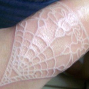 visit our site http://www.whiteinktattoosreview.com/ for more information on White Ink Tattoos.The advantage of a White Ink Tattoos is its unique look, subtle but distinctive, often appearing as a brand, but capable of more intricate detail and the added dimensional advantage of the slightly raised skin. Tattoo Pols, Lace Tattoo White, Lace Tattoos, Black Light Tattoo, Lace Tattoo Design, Spider Web Tattoo, Web Tattoo, White Spider, White Ink Tattoo