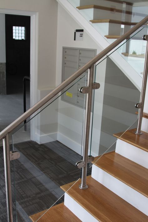 Stair Railing Design Stainless Steel, Stainless Stair Railing, Stainless Steel Handrail Design, Steel And Glass Railing Design, Stair Decorations, Stairs Tiles Design, Stainless Steel Stair Railing, Glass Staircase Railing, Glass Railing Stairs