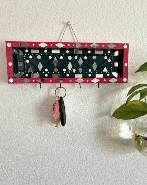 Available to buy Clay/Lippan art key holders Size 12 inches wide. 4 keys can be hanged . Perfect for gift purposes. Can customize according to orders. Asking price $17 #keyholders #keyholder #gift #handmade #homedecor #keychain #souvenirs #walldecor #decor #customized #keyholdercreations #personalizedkeyholder #cordholder #design #justlove Clay Lippan Art, Personalized Key Holder, Lippan Art, Cord Holder, Key Holders, Gift Handmade, Key Holder, Size 12, Key