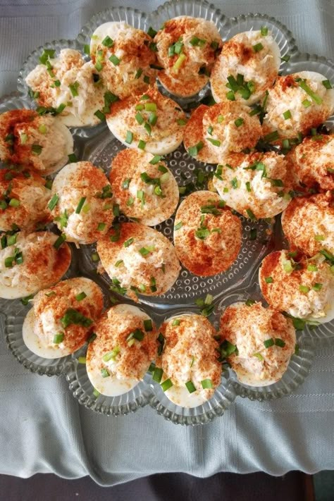 Crab-Stuffed Deviled Eggs | "These eggs are actually also stuffed with crab, not just topped with crab. They are extremely easy to make. This recipe includes my famous 17-minute egg-cooking method." #easter #eastereggs #deviledeggs #easterrecipes #easterideas #easterappetizers #easterinspiration #easterweekend #appetizer #eggs #deviledeggs #allrecipes Crab Deviled Eggs, Stuffed Deviled Eggs, Crab Deviled Eggs Recipe, Deviled Eggs Recipes, Devilled Eggs Recipe, Fried Deviled Eggs, Eggs Deviled, Stuffed Eggs, Deviled Egg Recipes