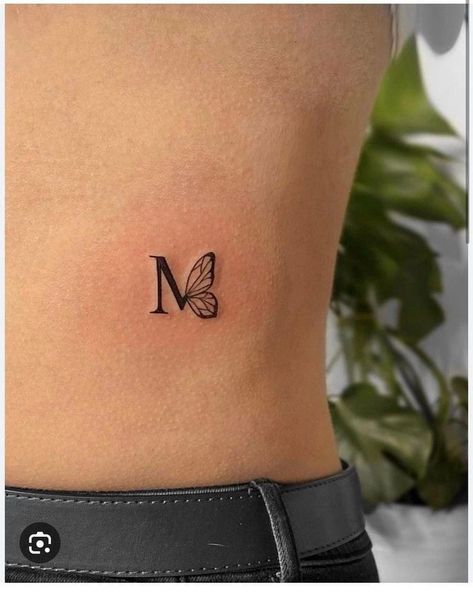 M Name Tattoo Designs, M Small Tattoo, Tony Tattoo Ideas, Butterfly Tattoo With Initials, Tattoos Cartoon, Simple Tattoos For Women, M Tattoos, Small Pretty Tattoos, Petite Tattoos