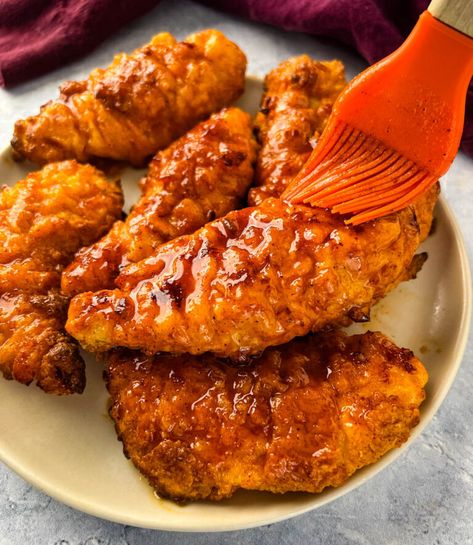 Nashville Hot Chicken Tenders Nashville Hot Chicken Tenders, Hot Chicken Tenders, Nashville Hot Chicken Recipe, Hot Sauce Chicken, Spicy Chicken Tenders, Spicy Butter, Buttermilk Chicken Tenders, Hot Chicken Recipe, Nashville Chicken