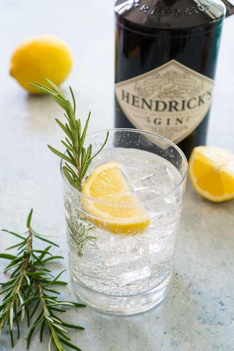 Light and refreshing herbal take on the traditional Gin Fizz, this Rosemary Gin Fizz combines the flavors of rosemary and lemon, is only 5 ingredients and egg-free. #cocktails #happyhour #gin Artsy Cocktails, Rosemary Gin Fizz, Gin Fizz Recipe, Best Gin Cocktails, Gin Fizz Cocktail, Girly Drinks, Fizz Cocktail, Gin Sour, Rosemary Simple Syrup