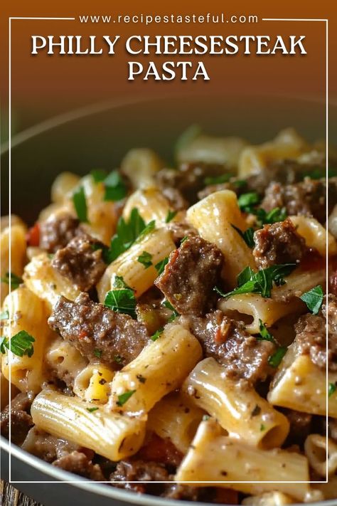 This Philly Cheesesteak Pasta combines the best parts of a classic Philly cheesesteak with creamy pasta. Ground beef (or steak strips), sautéed vegetables, and a rich, cheesy sauce make this a comforting and flavorful dish. It’s the perfect weeknight dinner that’s easy to prepare and packed with savory, cheesy goodness. Shaved Steak Pasta, Cheesesteak Pasta Recipe, Philly Cheese Steak Mac And Cheese, Pork Cheesesteak, Steak Pasta Recipes, Philly Cheese Steak Pasta, Steak And Pasta, Philly Cheesesteak Pasta, Pasta Ground Beef