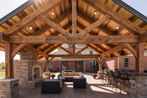 Timber Frame Outdoor Entertaining Space Timber Frame Outdoor Living, Timber Frame Outdoor Kitchen, Diy Shelter Outdoor, Outdoor Kitchen Pavillion, Rustic Carport, Timber Frame Gazebo, Patio Pavilion, Backyard Pool House, Outdoor Pavillion