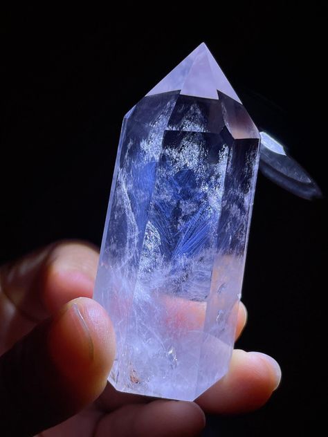 Beautiful Clear Quartz Tower with Blue Rutiles, Rainbow Blue Needle Clear Crystal Wand, Blue Angel's Feathers Quartz, 77g Size: 65*30mm. You will receive the exact one in the pictures. Clear Quartz is a Power Crystal. It harnesses the Power of Amplification, Relaxation, Calming, and has an Enlightening Effect. It helps one Clear the Space in Front of them, allowing Clarity of Thought, Purpose and Action to take place.  "Blue needle" is a treasure in crystal. It is called an angel's feather. It usually looks the same as white crystal, but under strong light, there are blue "needle-like" inclusions inside the crystal. The same as feathers. According to legend, only lucky people can find them, because blue needles are very rare, and it takes a certain amount of luck and patience to find them. Angel Feathers, Power Crystals, Crystal Wand, Blue Angels, White Crystal, Clear Quartz, Natural Crystals, Clear Crystal, The Space