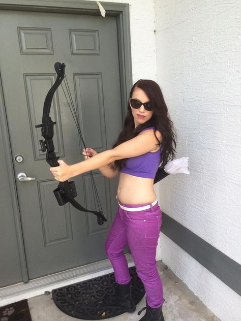 (Ignore the fat - this is pre-diet/exercise.) My Kate Bishop/Hawkeye cosplay from Tampa Bay Comic-Con. A DIY. We dyed the top, pants, and gloves (not shown) ourselves and made the quiver and arrows ourselves. Hawkeye Cosplay, Kate Bishop Hawkeye, Kate Bishop, Diet Exercise, Quiver, Hawkeye, Fitness Diet, Tampa Bay, Tampa